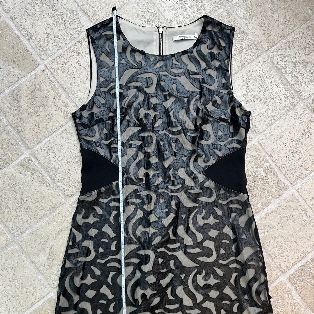 Lucy Paris illusion mini dress with mesh cutouts at waist. Size L